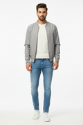 Light blue men's jeans - front white background