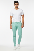 Mint green men's jeans - front white background